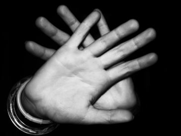 Hands up to stop domestic abuse.