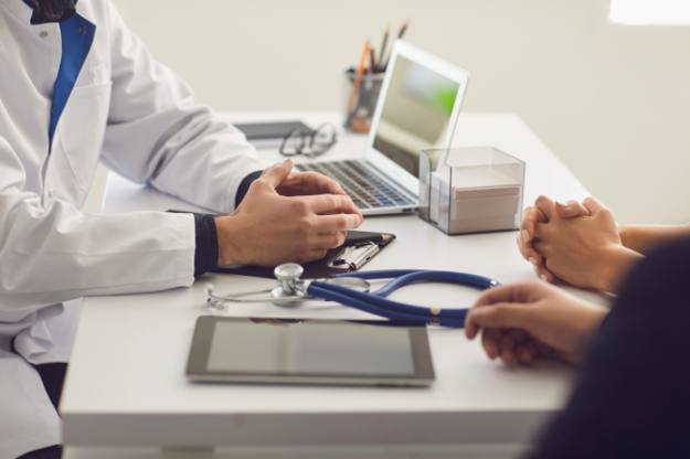 Fleetwood Solicitors – What is Medical Negligence? No Win No Fee Claims A patient meeting with a doctor, representing medical claims advice from Fleetwood solicitors for Medical Negligence and No Win No Fee Claims.